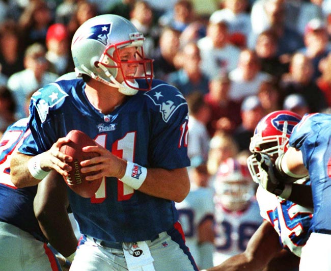 A 1997 photo of New England Patriots quarterback Drew Bledsoe dropping back to pass.