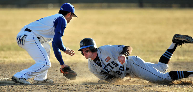 COMING UP SHORT: Colby College second baseman Taro Gold, left, tags out Tufts’ David Orlowitz on a stolen base attempt in the fifth inning Friday at Coombs Field at Colby College in Waterville