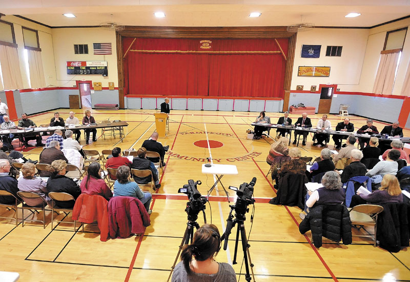 Farmington residents gather Saturday in the gymnasium during the town meeting at the Farmington Community Center.