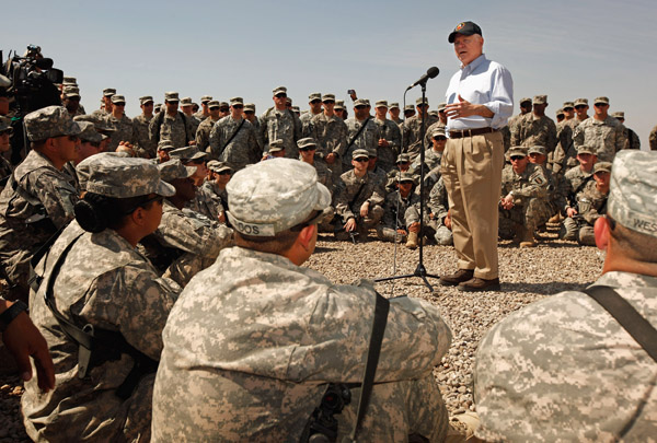 U.S. Defense Secretary Robert Gates talks with troops from the U.S. Army 25th Infantry Division today and answers their questions during a visit at Camp Victory in Baghdad, Iraq.
