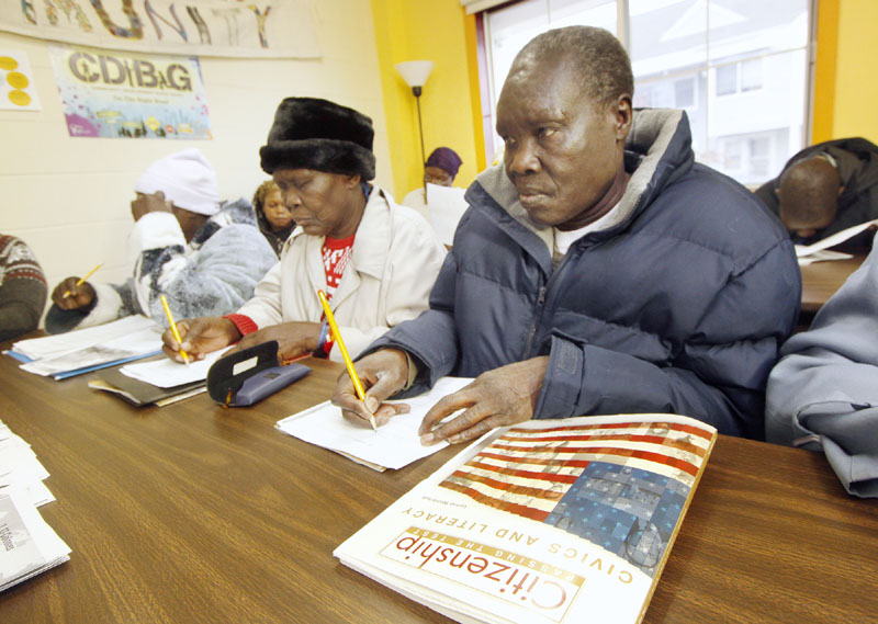 Peter Aboda and Franseska Achiro, pictured here on march 31, are among a group of Sudanese refugees and immigrants taking a civics class in Portland.