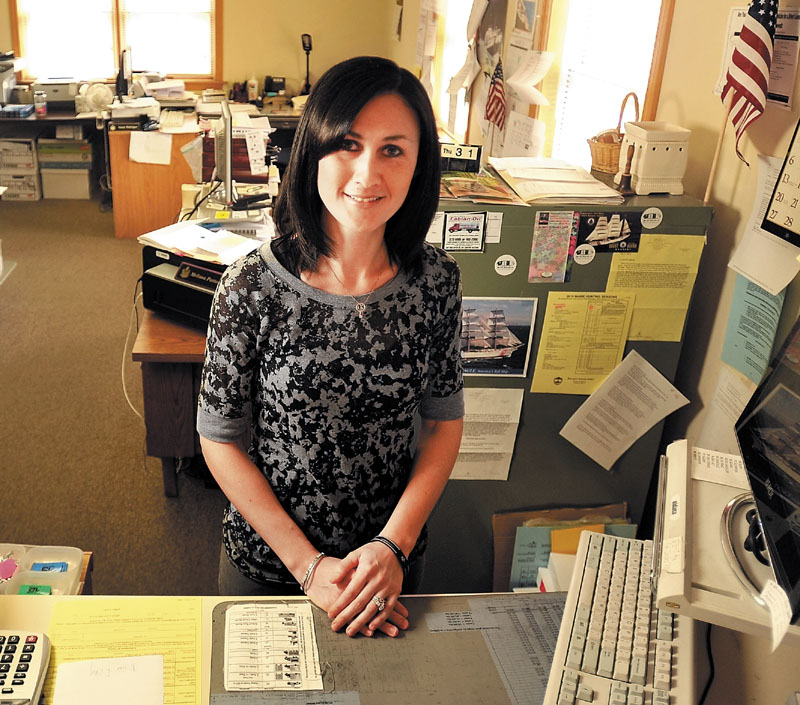 Melissa Patterson, a Benton selectwoman and town office clerk, pictured above, would see her service cut short if the legislature approves a proposal by Rep. David Cotta, R-China, that would make it illegal for an elected municipal officer to simultaneously be a town employee.