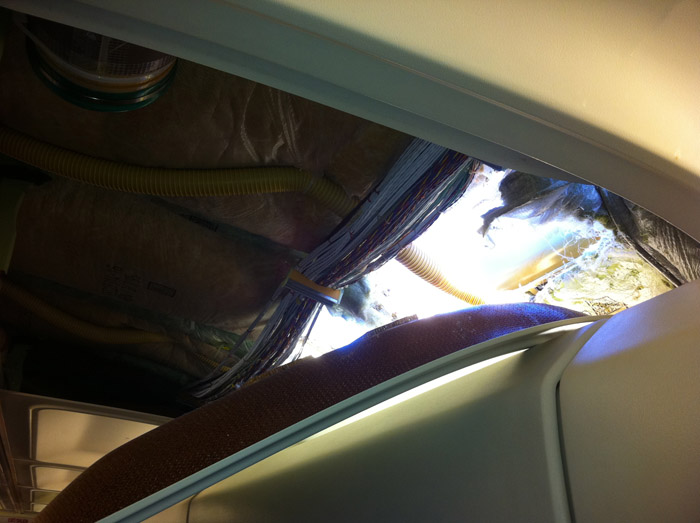 This photo provided by passenger Christine Ziegler shows an apparent hole in the cabin on a Southwest Airlines aircraft Friday, April 1, 2011, in Yuma, Ariz. airplane