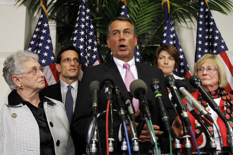 Speaker John Boehner of Ohio, center, speaks to the press with from left, Rep. Virginia Foxx, R-N.C., Majority Leader Rep. Eric Cantor, R-Va., Rep. Cathy McMorris Rogers, R-Wash., and Rep. Judy Biggert, R-Ill., on Capitol Hill Friday, April 8, 2011. The White House and congressional leaders reached agreement to cut billions of dollars in spending to avoid the first government shutdown in 15 years.
