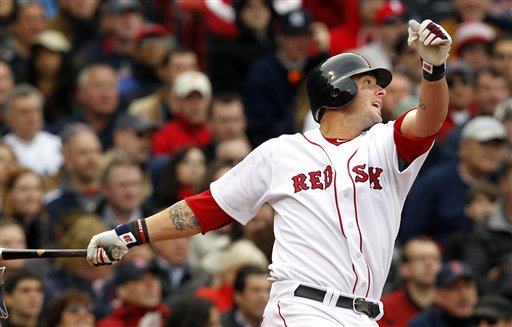 TAKING THE LEAD: Boston Red Sox catcher Jarrod Saltalamacchia hits an RBI double, scoring Kevin Youkilis and breaking a 6-6 tie against the New York Yankees in the fifth inning of the Red Sox’ 9-6 win over the New York Yankees on Friday at Fenway Park in Boston.