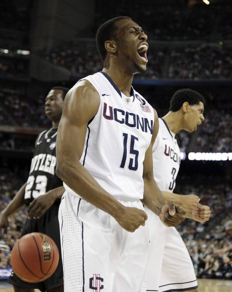 EMOTIONAL CHARGE: Connecticut's Kemba Walker reacts after being fouled as he made a basket during the first half of the championship game against Butler on Monday night in Houston. Walker scored 16 points for UConn, which won 53-41 and went 11-0 in the Big East and NCAA tournaments to finish the season.