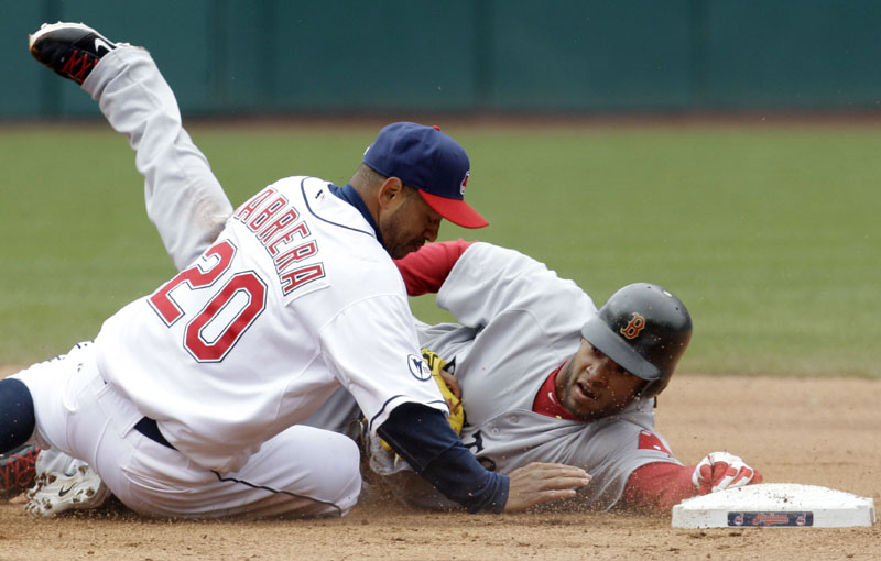 ANOTHER BLUNDER: Cleveland second baseman Orlando Cabrera, left, tags out Boston Red Sox baserunner Darnell McDonald at second base in the ninth inning to end the Indians’ 1-0 victory Thursday afternoon in Cleveland. At 0-6, the Red Sox are off to their worst start since 1945, when they lost a team-record eight straight.