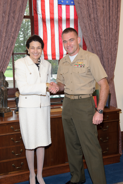 Senator Snowe welcomes Captain Coté to Washington.