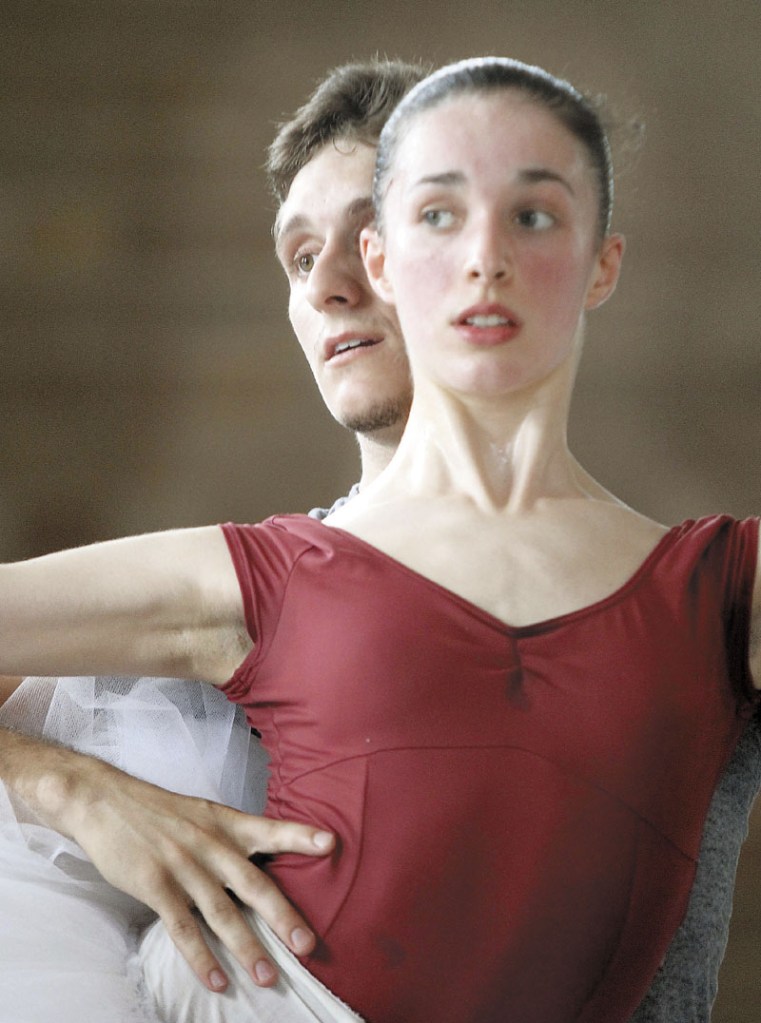 A STUDENT OF BALLET: Ryan Jolicoeur-Nye listens to instructions from Andrei Bossov while rehearsing with Caroline Doherty for the Bossov Ballet Theatre's production of "Swan Lake" in Pittsfield recently.