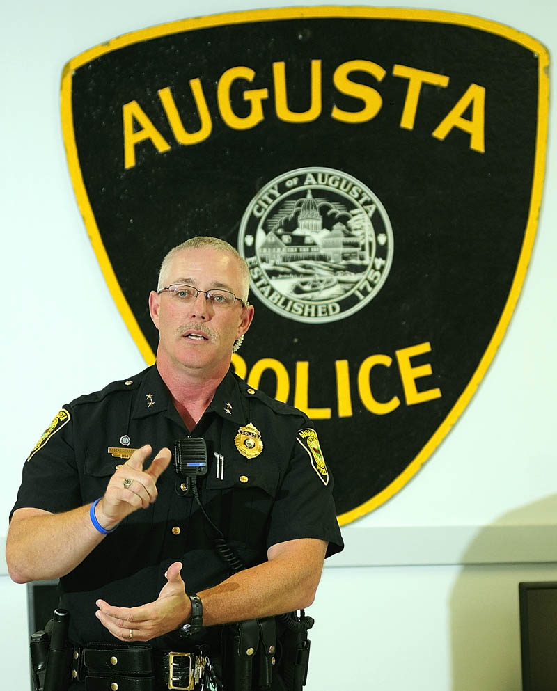 Augusta Police Chief Robert C. Gregoire a ceremony congratulate several officers on recent promotions and to swear in new officer Anthony Drouin on Friday in Augusta.