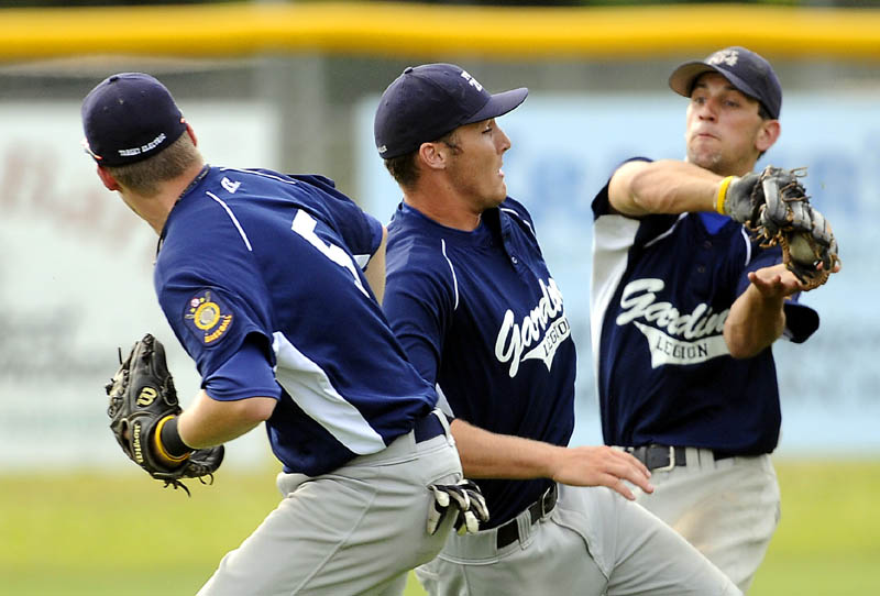 HEADS UP: Gardiner ‘s Cody Plourde, right, Forrest Chadwick, center, and Spencer Allen converge in center field as Plourde catches a popup Monday during an American Legion Zone 2 playoff game Monday in Augusta.