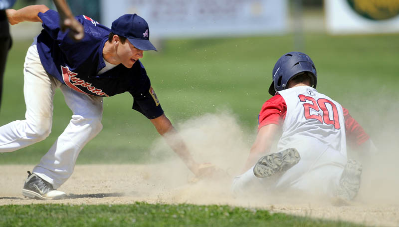 LATE: Augusta's Chandler Shostak, left, tries unsuccessfully to tag Post 51’s Sam Dexter as Dexter slides safely into second base during the Zone 2 tournament Sunday in Augusta.