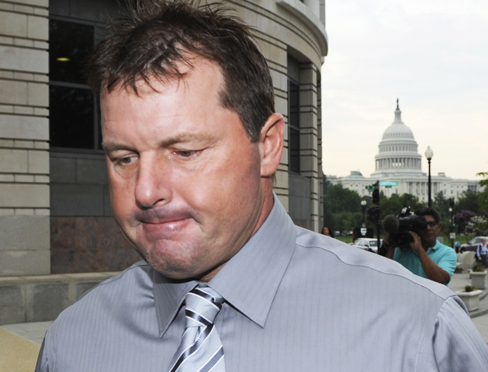 With the Capitol in the background, former Major League Baseball pitcher Roger Clemens arrives at federal court in Washington today for his trial on charges of lying to Congress in 2008 when he denied ever using performance-enhancing drugs during his 23-year career.
