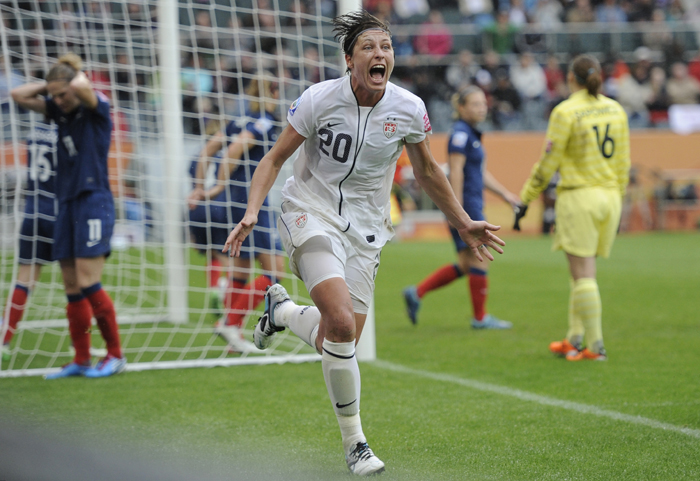 United States' Abby Wambach celebrates scoring her side's 2nd goal during the semifinal match between France and the United States at the Women's Soccer World Cup in Moenchengladbach, Germany, today.