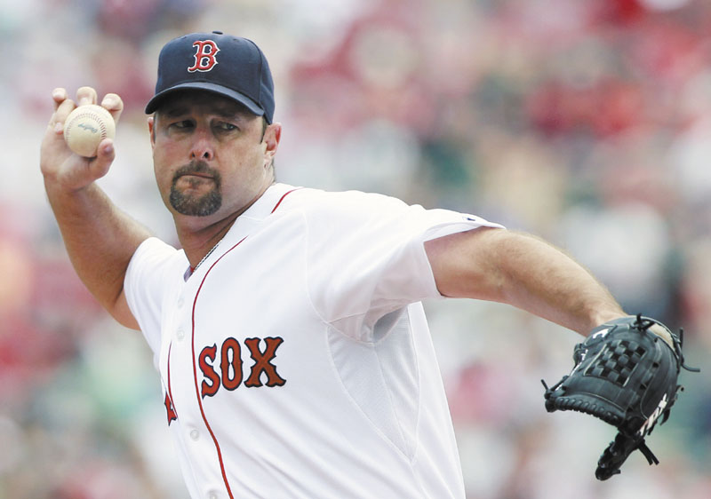 MILESTONE DAY: Boston pitcher Tim Wakefield earned his 199th career victory Saturday as the Red Sox beat the Seattle Mariners 12-8 at Fenway Park in Boston. Wakefield also recorded his 2,000th strikeout in a Red Sox uniform.
