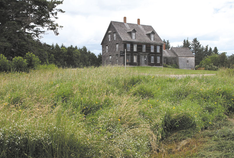 The Olson House, where Andrew Wyeth painted “Christina’s World,” is seen Friday in Cushing. The house was one of 14 locations to receive a national landmark designation from U.S. Secretary of the Interior Ken Salazar.