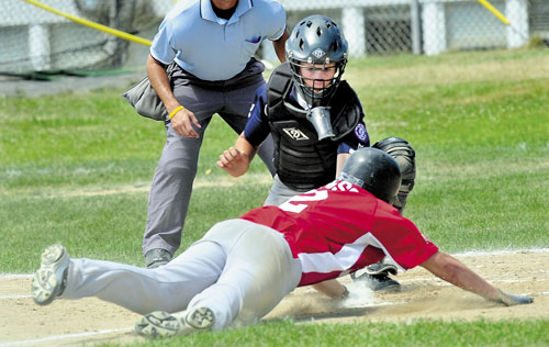 NICE PLAY: Central Maine’s cather Bobby Chenard tags out Portland’s Jordan Floridino at a plate at the plate Saturday during the 14-year-old Babe Ruth state tournament Saturday at Lawrence High School in Fairfield.