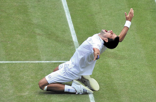 YES, I DID IT: Novak Djokovic celebrates after defeating Jo-Wilfried Tsonga in their men’s semifinal match at Wimbledon on Friday at the All England Lawn Tennis Championships. With the win, Djokovic will take over the No. 1 spot in the world rankings on Monday.