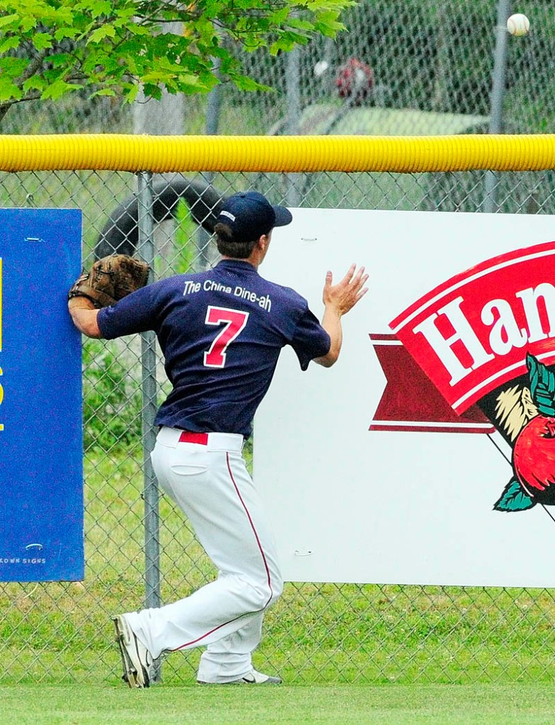 Luke Duncklee watches a long fly ball hit by Bangor hitter Dylan Morris bounces over the outfield wall for a ground rule double on Friday afternoon in Augusta.