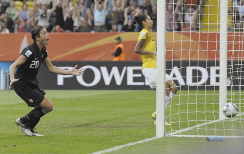 CLOSING THE GAP: United States’ Abby Wambach reacts after scoring her team’s second goal during a quarterfinal match against Brazil at the Women’s World Cup on Sunday in Dresden, Germany. The U.S. won 5-3 on penalty kicks after 2-2 tie to advance to the semifinals.