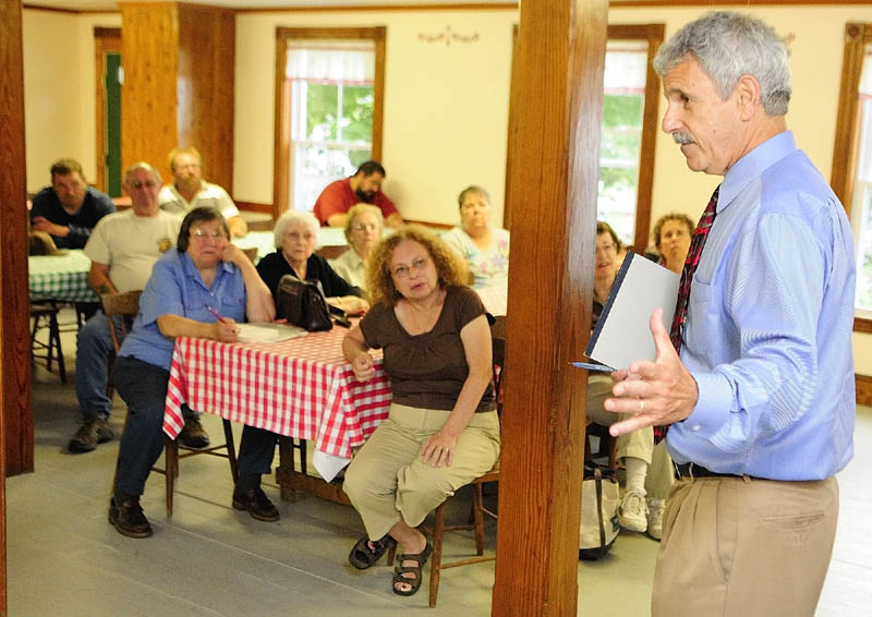 State Sen. Roger Katz, R-Augusta, speaks during a meeting about preventing the closure of the East Vassalboro Post Office held Wednesday night at at the East Vassalboro Grange Hall.