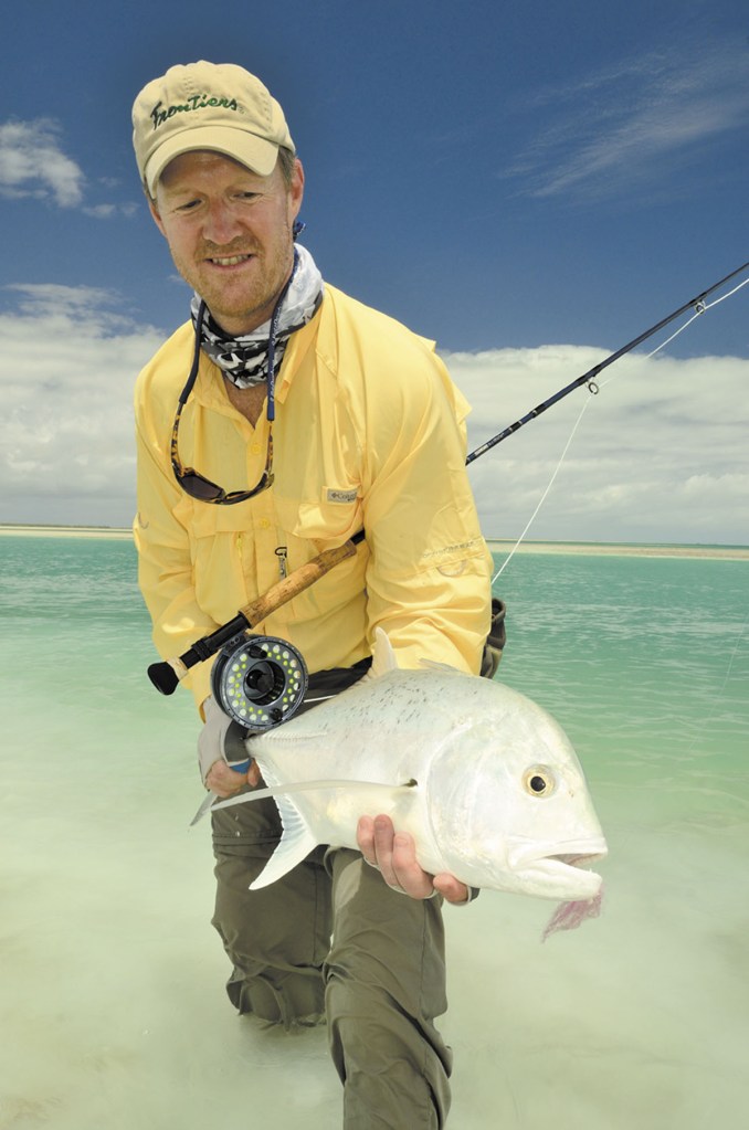 Augusta native Joe Linscott holds a bonefish he caught this spring at Christmas Island in the South Pacific. Linscott works for Frontiers Travel, a Pittsburgh company that caters to fishermen and hunters seeking worldwide adventures. Christmas Island
