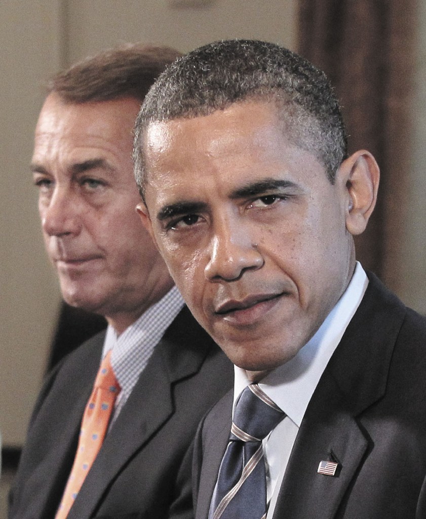 President Barack Obama and House Speaker John Boehner of Ohio take part in a meeting Thursday with Congressional leadership in the White House in Washington to discuss the debt.