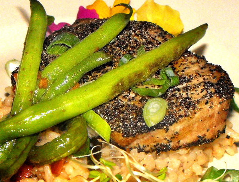 TASTE OF MAINE: Pan-seared black pepper-encrusted Gulf of Maine tuna is shown here. Al and Dianne Keene of Carrabassett Valley hope to publish the “Maine Locavore Cookbook” this fall, featuring recipes for local food.