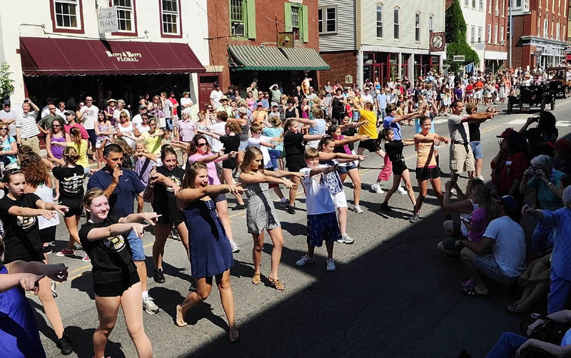 Dancers from Vicki's School of Dance perform in front of the judges' stand during the Old Hallowell Day parade on Saturday morning.