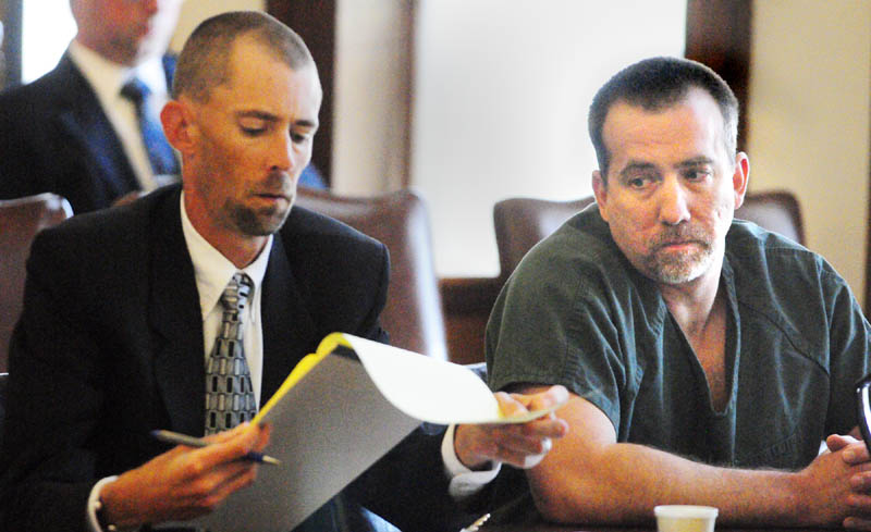 Robert MacMaster, right, confers with his attorney Sean Farris on Friday morning in Kennebec County Superior Court in Augusta. He was sentenced to four years, all but one-and-a-half years suspended, after being convicted by a jury of sexual abuse of a minor.