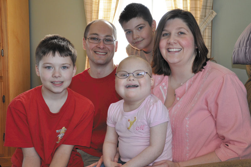 MAKE-A-WISH: The Joyce family, (from left to right) Ben, Jason, Chris, Elizabeth and Megan in the front, pose for a picture recently. The 1/2 Marathon/5K Run-or-Walk sponsors by PFBF, CPAs will raise money for Megan’s Make-A-Wish, which is a trip to Disney.