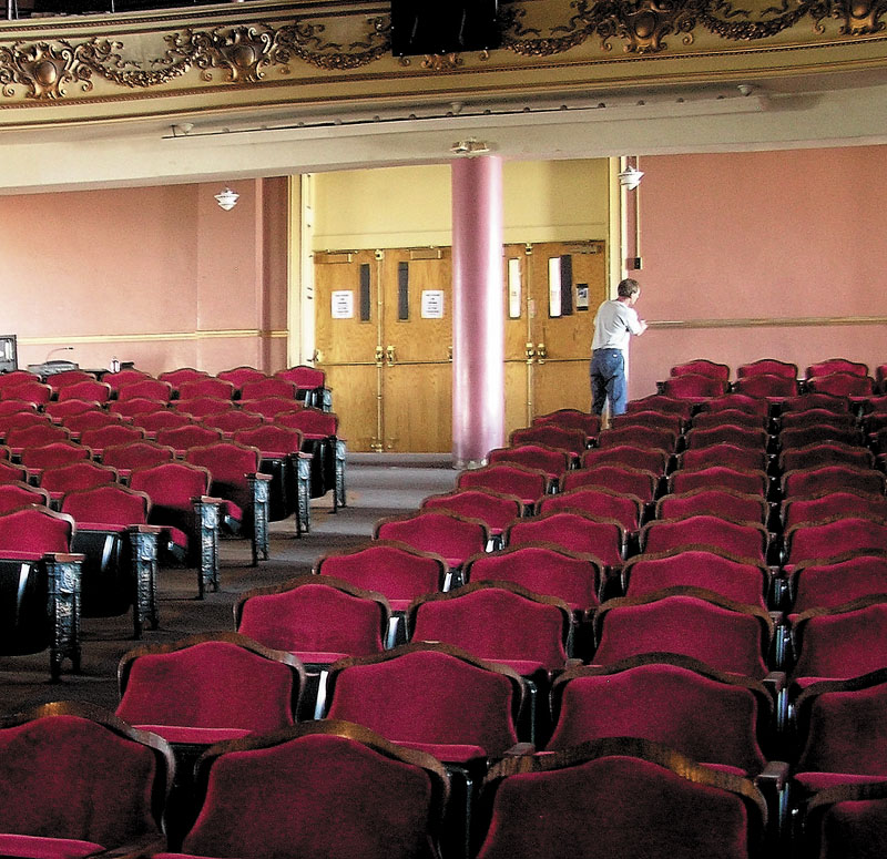 IN THE HOUSE: Dave Higgins, a city custodian, is seen inside the Waterville Opera House on Friday. Opera house officials announced Friday they had met a challenge grant from the Harold Alfond Foundation as part of a $4.3 million renovation and expansion of the building.