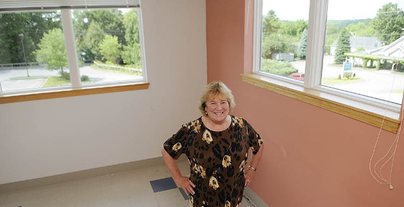 Chief Executive Officer Lynn Duby, stands in Crisis and Counseling Centers' new Caldwell Road office space Friday in Augusta.