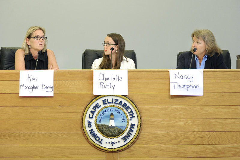 Democrat Kim Monaghan-Derrig, left, and Republican Nancy Thompson, right, appear at a recent candidates forum in Cape Elizabeth. At center is moderator Charlotte Rutty, a senior at Cape Elizabeth High School.