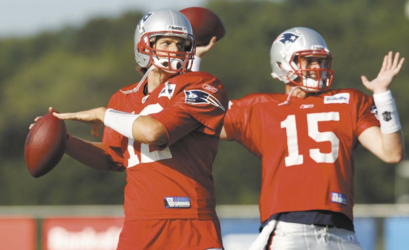 GETTING READY: New England Patriots quarterbacks Tom Brady, left, and Ryan Mallett (15) throw during practice Thursday in Foxborough, Mass.