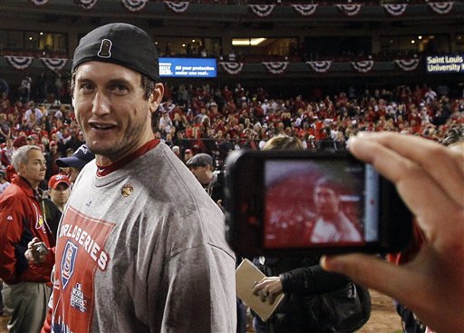 St. Louis Cardinals' David Freese celebrates after Game 7 of World Series against the Texas Rangers on Friday in St. Louis. The Cardinals won 6-2 to win the series.