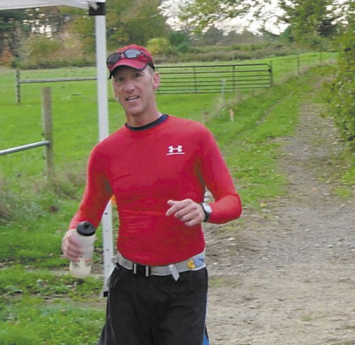 RUNNING ALONG: John Rodrigue of Augusta recently completed the Farm to Farm Ultra Run, a 50-mile race.