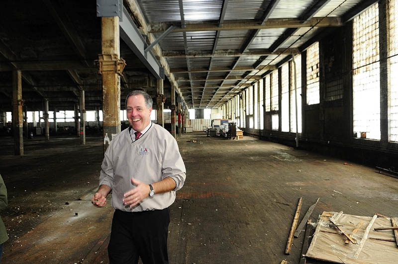 Lewiston city official Lincoln Jeffers leads a tour of the Bates Mill No. 5 in Lewiston, the proposed site of a casino.