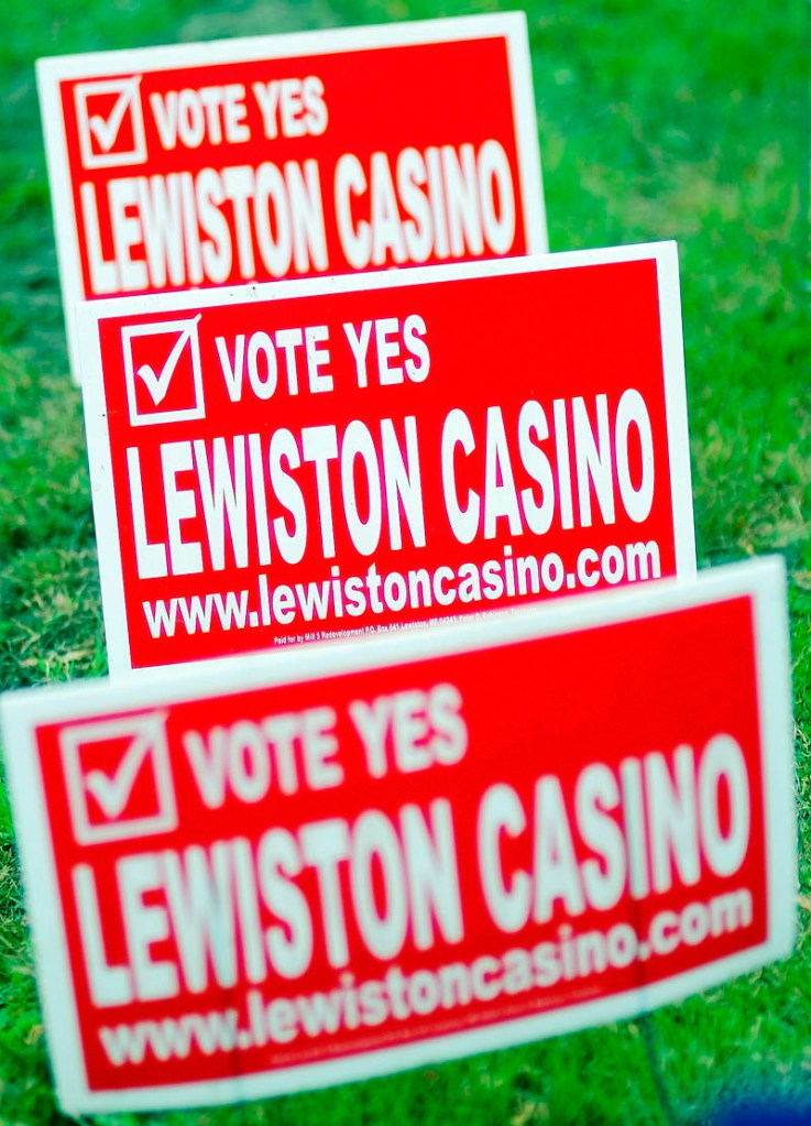 Campaign signs on Main Street support a referendum that would allow the The Bates Mill No. 5 in Lewiston be turned into a casino.