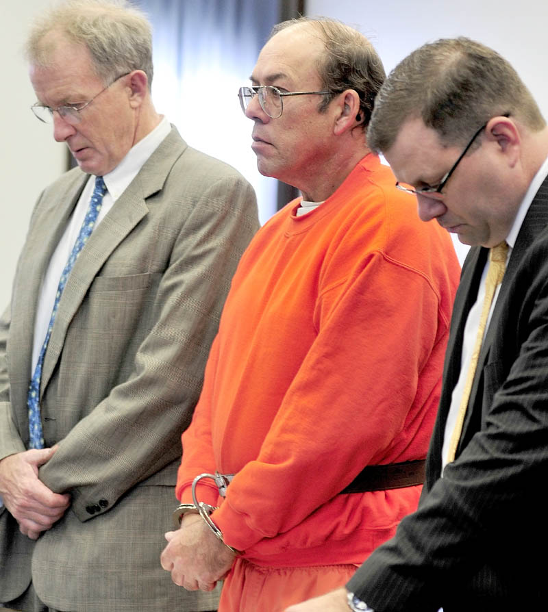 Defendant Jay Mercier listens to Justice John Nivison flanked by his attorneys John Alsop, left, and John Martin in Somerset Superior Court in Skowhegan on Thursday. Mercier has pleaded not guilty to the murder of Rita. St. Peter 31 years ago. Mercier, who has been charged with killing Rita St. Peter 31 years ago in Anson, has an extensive history in the court system. In the last 20 years, he has faced more than a dozen criminal and civil court matters.