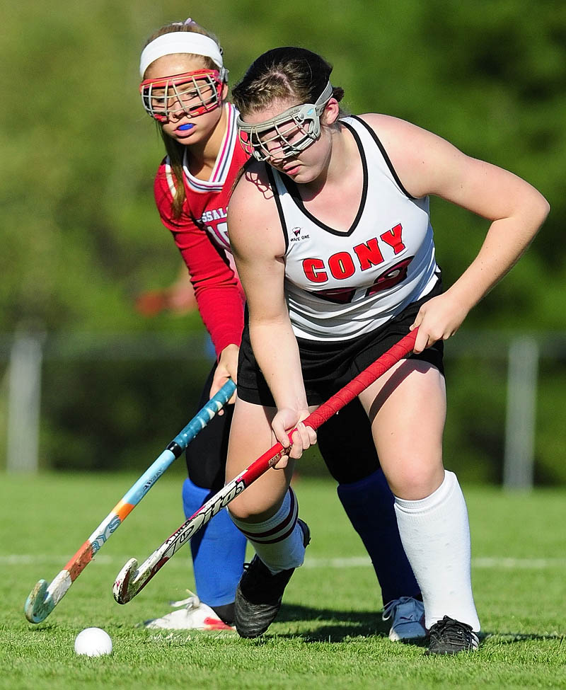 ON THE BALL: Messalonskee’s Emily York, left, and Cony’s Heather Leet battle for the ball during a game Thursday afternoon at Cony High School in Augusta.