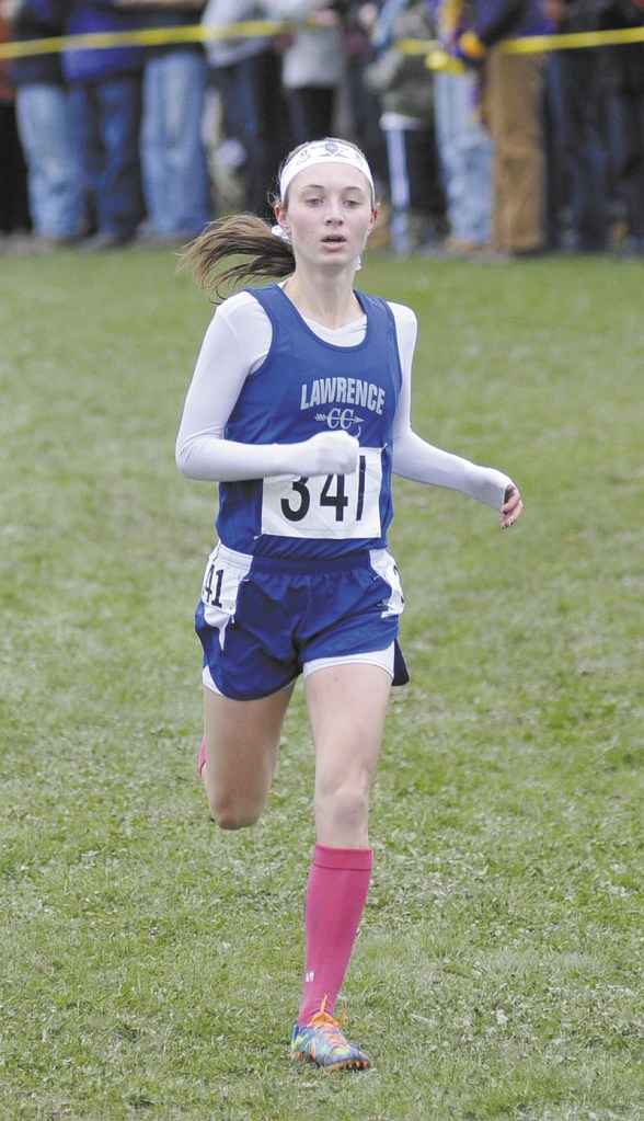 Lawrence's Erzsebet Nagy runs during the Class A state cross country championships Saturday at Twin Brook Recreation Area in Cumberland.