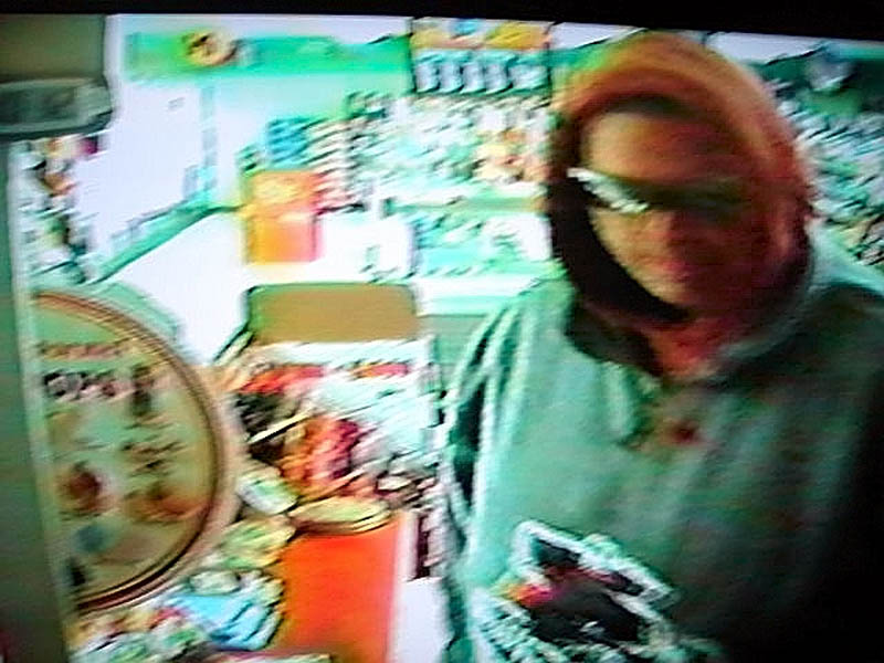 SUSPECT: Police are seeking this man, shown in surveillance video footage, who robbed the Big Apple convenience store in Fairfield Center on Thursday.