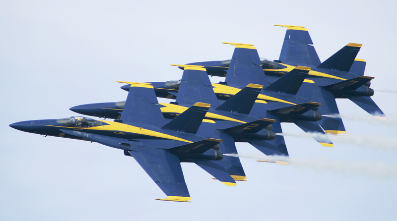 In this 2006 photo, the U.S. Navy Blue Angels precision flying team rehearses at Little Rock Air Force base in Jacksonville, Ark. The Navy's Blue Angels have been thrilling audiences for more than six decades with their acrobatic flying.