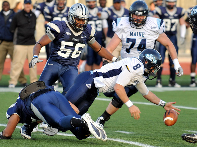 Quarterback Warren Smith (8) and the University of Maine football team earned a bye in the FCS playoffs.