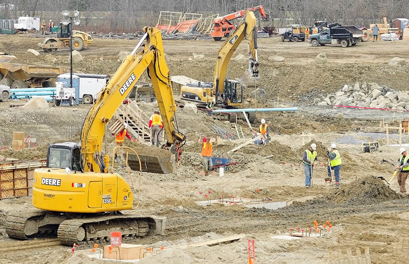 STEADY WORK: Construction work continues Monday afternoon at the site of the new MaineGeneral hospital in Augusta.
