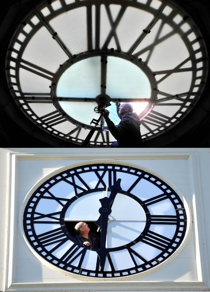 Staff photo by Michael G. Seamans Rick Balzer, owner of Balzer Family Clock Works, lubricates the minute and hour hand gears inside and out on one of four clock faces on the Miller Library clock tower at Colby College in Waterville Tuesday morning. The Miller Library has four clock facing aspects that each need to be lubed and serviced every year.