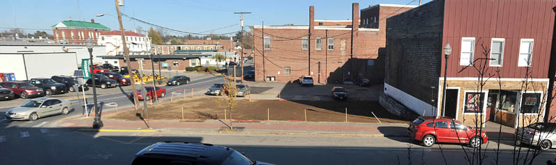 Open space replaces the spot where three buildings stood recently in downtown Skowhegan.