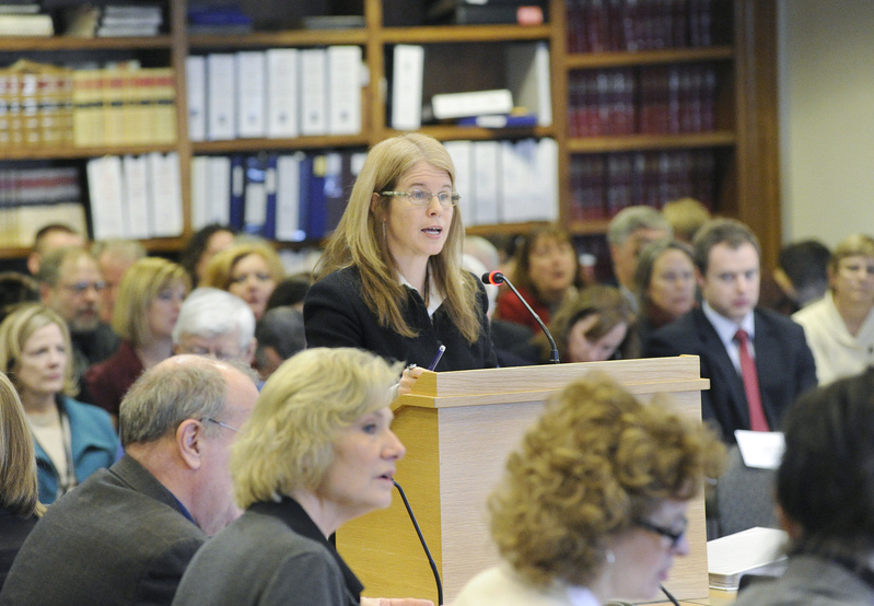 Maine Commissioner of Health and Human Services Mary C. Mayhew speaks to the Joint Standing Committee on Health and Human Services and the Committee on Appropriations & Financial Affairs in a packed room at the State House in Augusta on Wednesday.