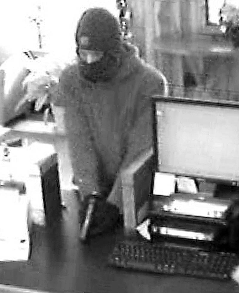 A man who robbed Border Trust Co. on Route 3 in South China on Friday is seen from the bank’s surveillance camera.